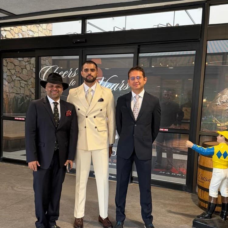 Chaitania Kumar, Arsalan Khan and Prem dressed for the races in the Griffin Gate lobby