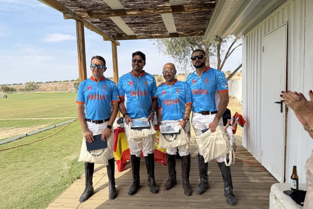 Team India at the prize giving with the HPRC pennant and commemorative shirts